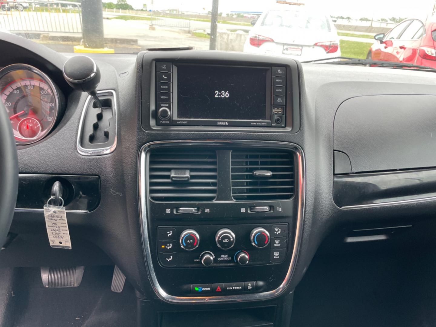 2017 Maroon Dodge Grand Caravan Passenger (2C4RDGBG9HR) with an V6, Flex Fuel, 3.6 Liter engine, Automatic, 6-Spd transmission, located at 8008 Warden Rd, Sherwood, AR, 72120, (501) 801-6100, 34.830078, -92.186684 - Photo#16